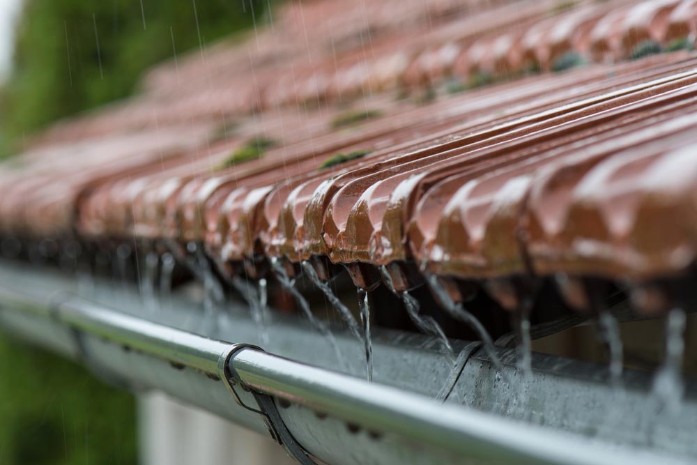 Water flowing down rain gutters