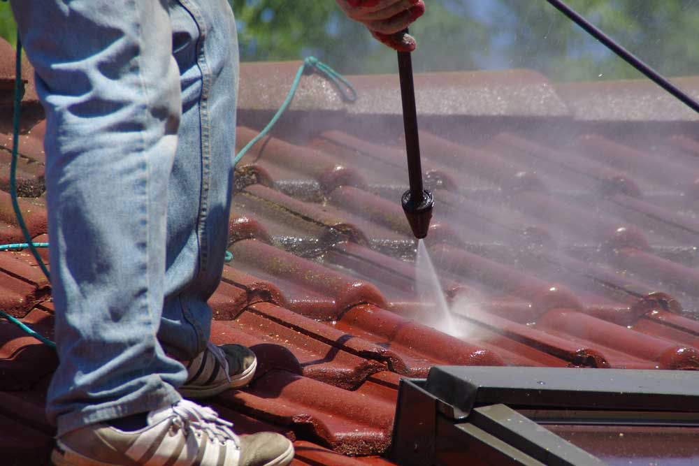 Roof being (soft) washed Hoschton, GA