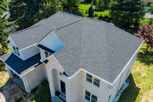 Aerial view of a house showing roof Hoschton, GA