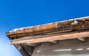 roof gutter with rust and/or damage